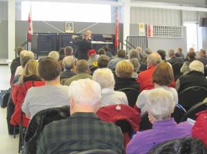 David Donnelly (standing at front) makes a submission to OMB Member Marc Denhez.
